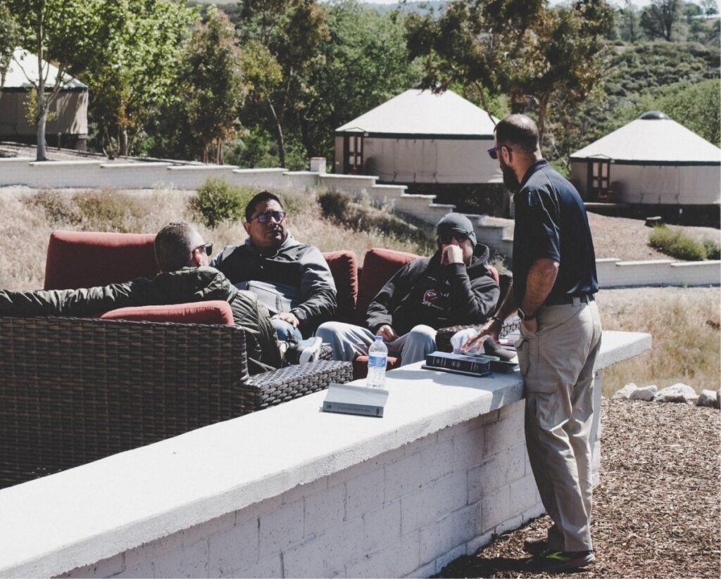 Instructor Speaking to Participants of the Men's Legacy Program